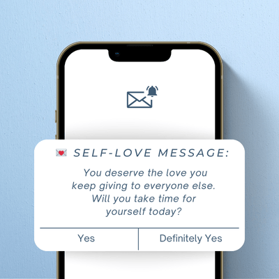 A smartphone displaying a notification with a message that reads: SELF-LOVE MESSAGE: You deserve the love you keep giving to everyone else. Will you take time for yourself today? Options to reply are Yes and Definitely Yes.